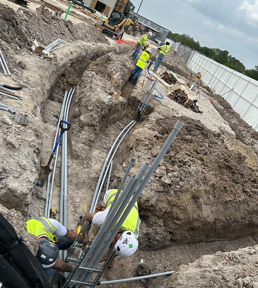 utility conduit installation crew Houston project